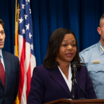 Assistant Attorney General Kristen Clarke of the Justice Department's Civil Rights Division speaks at a news conference