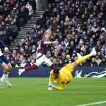 Newcastle United's Anthony Gordon scores their first goal past Tottenham Hotspur's Brandon Austin. Photo: Reuters