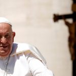 The Pope squints in the sun at the weekly general audience at Saint Peter's Square at the Vatican.