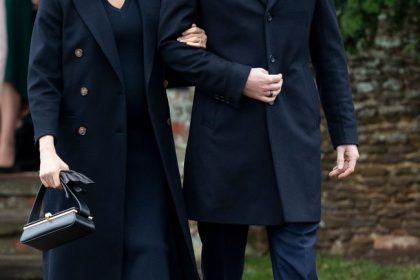 Prince Harry and Meghan Markle walking