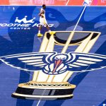 Pelicans logo on court