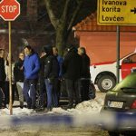 Police and security personnel stand near the scene where a gunman opened fire at a restaurant and killed several people in Cetinje, Montenegro, January 1, 2025. — Reuters