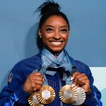 Simone Biles with her medals