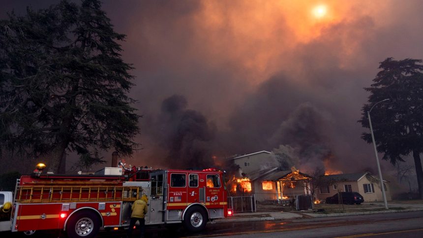 Thousands Flee From Uncontrolled Wildfires Burning Near LA