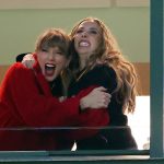 Taylor Swift and Brittany Mahomes hug at a football game