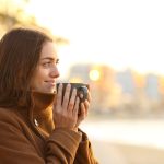 A woman hacing her morning coffee