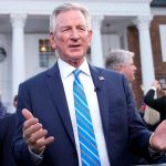 Tommy Tuberville talks during a television interview before former President Donald Trump speaks at Trump National Golf Club in Bedminster