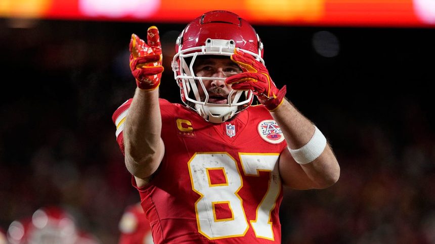 Travis Kelce points forward