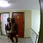 Tren de Aragua gang members rush apartment door