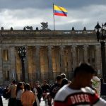 People walk at Plaza Bolivar on the day US President Donald Trump announced to impose tariffs and sanctions, in Bogota, Colombia on January 26, 2025. — Reuters