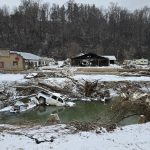 A section of Swannanoa, North Carolina, destroyed by Hurricane Helene is coated in snow.