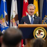 Chris Wray speaks at Garland's farewell ceremony