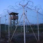 Chain link fence and concertina wire surrounds a deserted guard tower within Joint Task Force Guantanamos Camp Delta at the US Naval Base in Guantanamo Bay, Cuba March 21, 2016. — Reuters