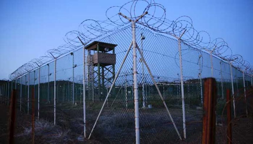 Chain link fence and concertina wire surrounds a deserted guard tower within Joint Task Force Guantanamos Camp Delta at the US Naval Base in Guantanamo Bay, Cuba March 21, 2016. — Reuters