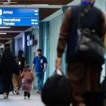 This handout photo taken on January 6, 2025 and received from the US embassy in Manila shows Afghans, whose US Special Immigrant Visa will be processed, arriving at an airport terminal on the Philippines Luzon island. — AFP