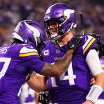 Cam Akers and Sam Darnold celebrate