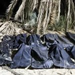 Bodies of migrants lie in bags, after they were discovered in a mass grave in a farm in Jikharra area, some 441 km from Benghazi, in Jikharra, Libya, February 5, 2025. — Reuters