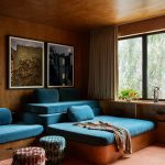 a media room with bright blue deep and casual bespoke sofa