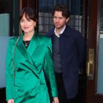 Dakota Johnson Wears Green Blazer With Black Slacks for Dinner in NYC