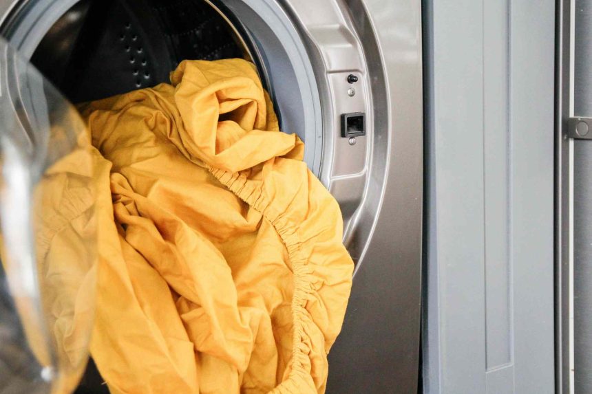 5 Clever Tips to Stop Sheets from Balling Up in the Dryer, According to Cleaning Pros