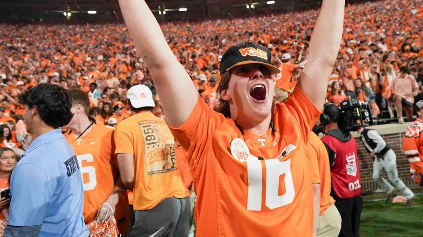 Tennessee fans run onto the field