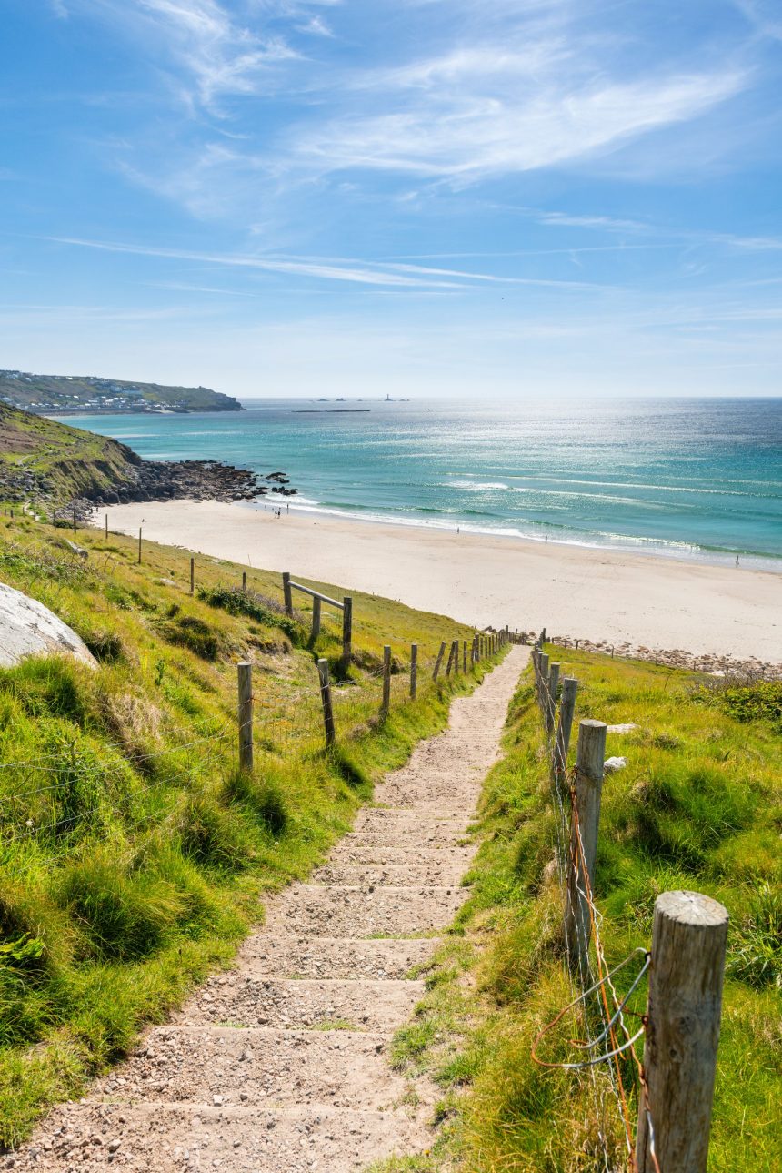 Image may contain Nature Outdoors Scenery Horizon Sky Path Sea Water Trail Shoreline Coast Beach and Grass