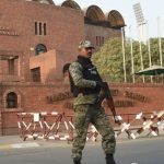 Security forces stand alert outside Gaddafi Stadium in Lahore on October 25, 2017. — AFP