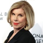 Christine Baranski smiling in a black outfit