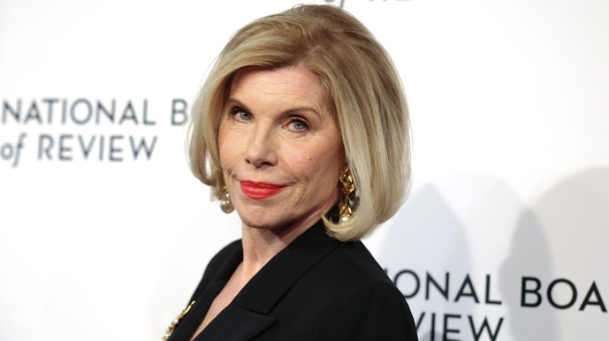 Christine Baranski smiling in a black outfit