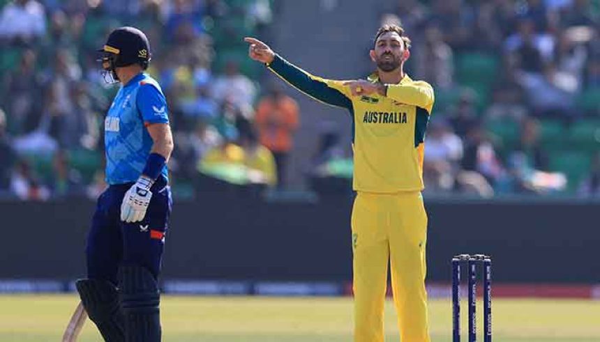 Players from the Australian and English team during the fourth group stage ICC Champions Trophy match. — Reuters