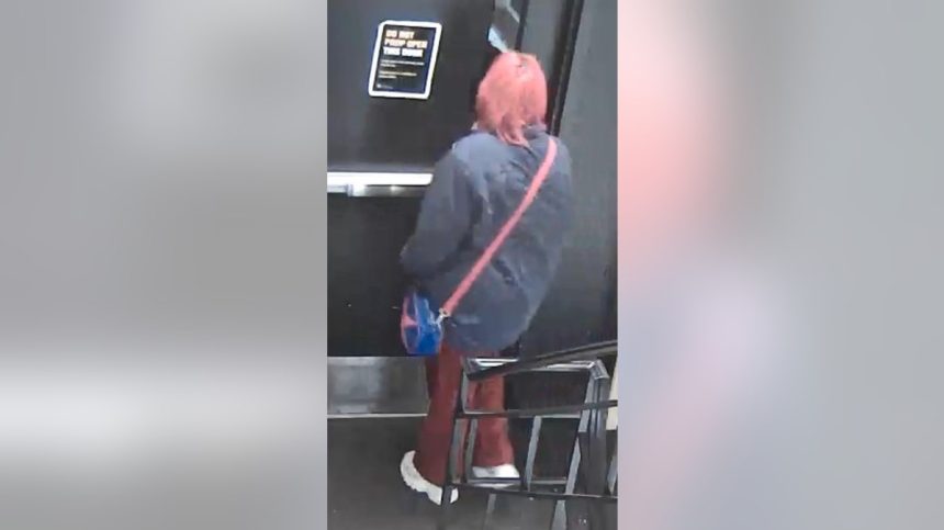 Trussell in her residence hall on Sunday, Feb. 9, wearing dark-colored yoga pants, a blue/gray jacket and white platform sneakers.