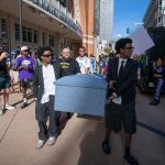 Mavericks fans carry coffin outside arena