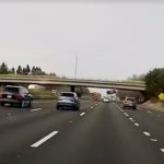 Vehicle flying off overpass