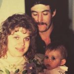 Greg and Kimberly Malnory with their young daughter