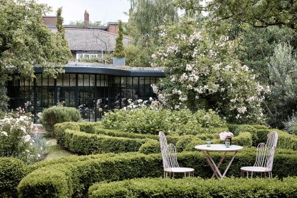 Image may contain Furniture Chair Garden Arbour Outdoors Patio Plant and Porch