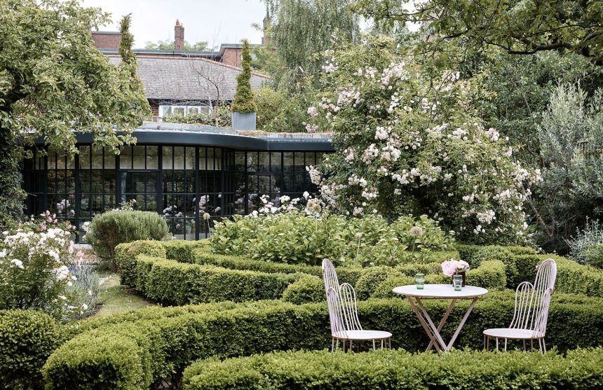 Image may contain Furniture Chair Garden Arbour Outdoors Patio Plant and Porch