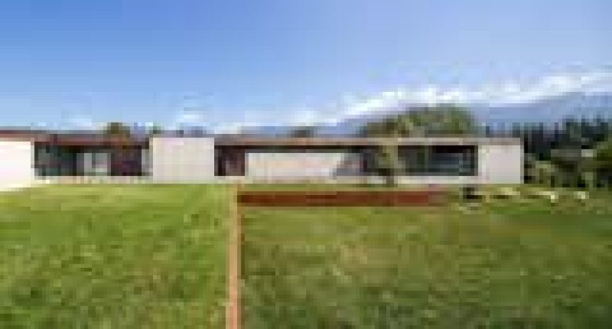 The wall that keeps the sheep in their pasture blends in with its surroundings and doesn’t compromise the beautiful views from the house.