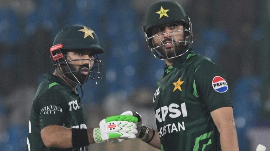 Pakistans white-ball skipper Mohammad Rizwan (L) fist bumping Vice-Captain Salman Ali Agha during the ODI against South Africa at the National Stadium Karachi on February 12, 2025. — AFP