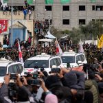 Palestinians watch parade of Israeli hostages through Gaza