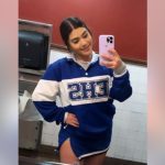 Liz Medina in a cheerleading uniform