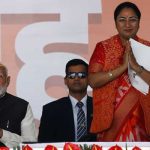 Prime Minister Narendra Modi applauds as Indias ruling Bharatiya Janata Partys Rekha Gupta greets the audience before taking her oath as the new Chief Minister of Delhi at the Ramlila grounds in New Delhi, India, February 20, 2025. — Reuters