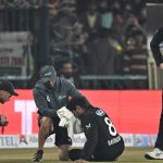 New Zealands Rachin Ravindra (centre) receives medical attention after being hit on the head by the ball during the tri-nation series first ODI match between Pakistan and New Zealand at the Gaddafi Stadium in Lahore on February 8, 2025. — AFP