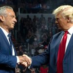 Robert F. Kennedy Jr. shakes hands with Donald Trump