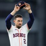 Alex Bregman waves to fans