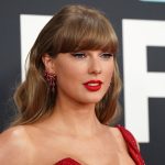 Taylor Swift sparks speculation in all-red ensemble at Grammys