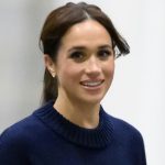 Meghan Markle smiling in a blue sweater while attending a wheelchair basketball game at the 2025 Invictus Games at the Vancouver Convention Centre on February 09, 2025 in Vancouver, British Columbi