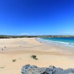 EP6NXW Looking along the beach at Harlyn Bay on the north coast of Cornwall in England.