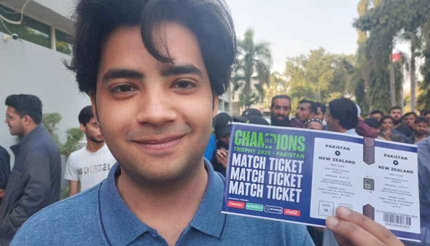 Cricket fan gestures after buying tickets for the inauguration match of the ICC Mens Champions Trophy 2025 at a designated centre in Karachi. — Reporter