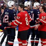 Team USA and Canada shake hands