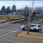 SUV stops on train tracks in Layton, Utah